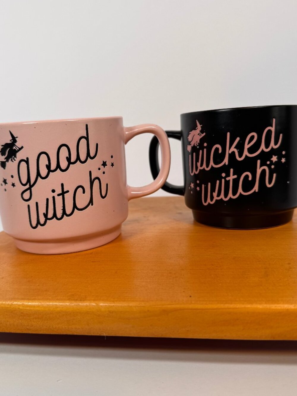 Cobwebs & Cauldrons set of one black Wicked and one Pink Good Witch Coffee Mug